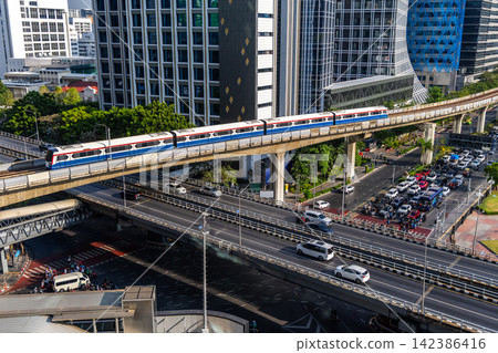 The Sky train in Bangkok with building The Sky train in Bangkok with building 142386416