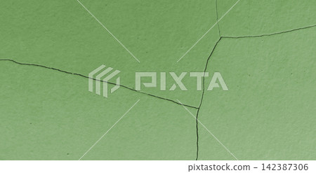 Cracked green concrete wall texture background Cracked green concrete wall texture background 142387306