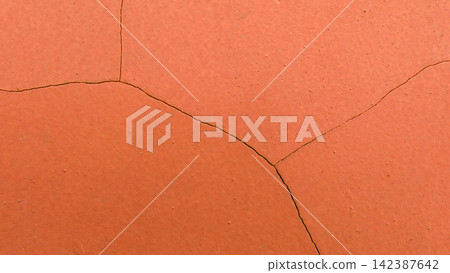 Cracked terracotta concrete surface texture Cracked terracotta concrete surface texture 142387642