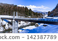 [Aomori National Sports Festival Venue] A newly constructed pedestrian bridge in the snow-covered Meya Valley and the snow-capped Mt. Iwaki (16:9 - Winter Civil Engineering Infrastructure) 142387789