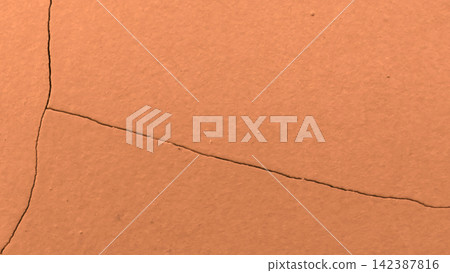 Cracked brown terracotta wall texture background 142387816