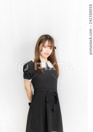 Summer outfit: Girl in a black dress Summer outfit: Girl in a black dress 142388058