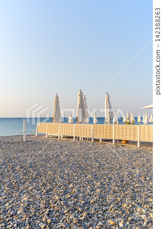 A morning scene on the beach in Nice, southern France, in the middle of summer. A morning scene on the beach in Nice, southern France, in the middle of summer. 142388263