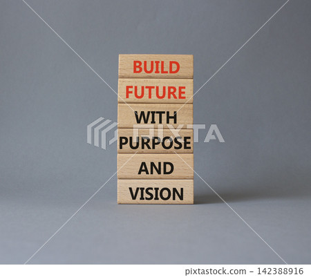 Build future with purpose and vision symbol. Concept words build future with purpose and vision on wooden blocks. Beautiful grey background. Business concept. Copy space. Build future with purpose and vision symbol. Concept words build future with purpose and vision on wooden blocks. Beautiful grey background. Business concept. Copy space. 142388916