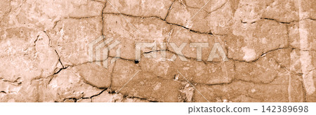 Cracked concrete wall texture with a weathered terracotta finish. Cracked concrete wall texture with a weathered terracotta finish. 142389698