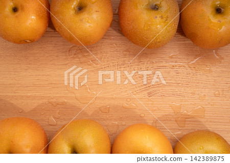 Pears lined up side by side; copy space available. Pears lined up side by side; copy space available. 142389875