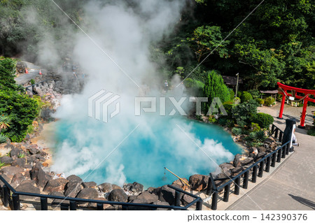 Aerial view of Umi Jigoku or Sea Hell hot springs by red torii gate, Beppu Aerial view of Umi Jigoku or Sea Hell hot springs by red torii gate, Beppu 142390376