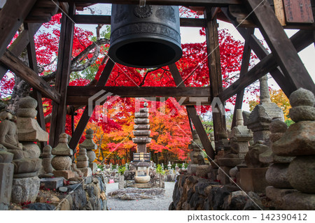 Bell tower by graveyard pagoda and fall leaf colors, Adashino, Arashiyama Bell tower by graveyard pagoda and fall leaf colors, Adashino, Arashiyama 142390412