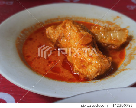Authentic Indonesian Gulai Gajeboh, traditional Padang curry made with tender fatty beef brisket in rich coconut gravy Authentic Indonesian Gulai Gajeboh, traditional Padang curry made with tender fatty beef brisket in rich coconut gravy 142390785