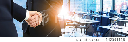 Double exposure of handshake between businessman with empty conference room prepared for seminar or business meeting - Business success agreement, Immovable property concept. panoramic banner. Double exposure of handshake between businessman with empty conference room prepared for seminar or business meeting - Business success agreement, Immovable property concept. panoramic banner. 142391118