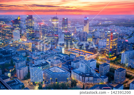 Layered Warsaw skyline skyscrapers at blue hour twilight in Poland Layered Warsaw skyline skyscrapers at blue hour twilight in Poland 142391200