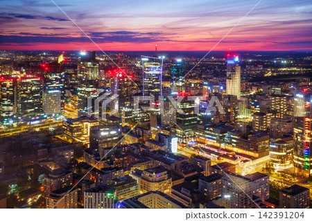 Vivid Warsaw skyline skyscrapers at blue hour twilight in Poland 142391204