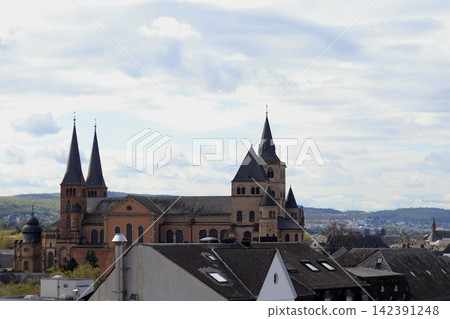 Trier Cathedral as seen over the rooftops of the old town Trier Cathedral as seen over the rooftops of the old town 142391248