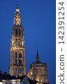 The Cathedral of Our Lady of Antwalpen shines brightly against the blue night sky. 142391254