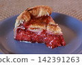 A slice of homemade strawberry tart 142391263