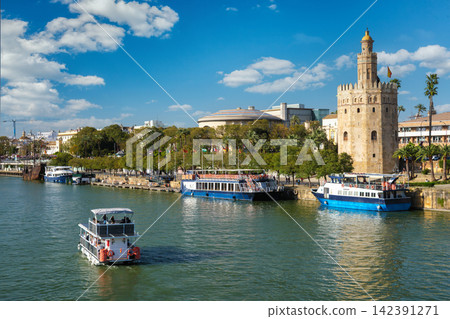 Torre del Oro and boats on Guadalquivir River, Seville Torre del Oro and boats on Guadalquivir River, Seville 142391271