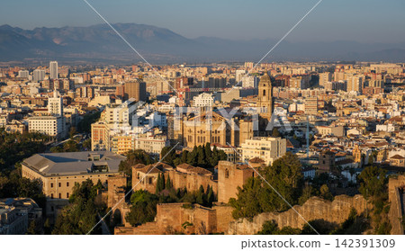 Aerial view of the cityscape and Malaga Cathedral at sunrise Aerial view of the cityscape and Malaga Cathedral at sunrise 142391309