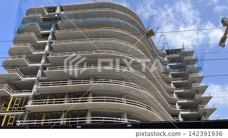 High-rise building under construction 142391936