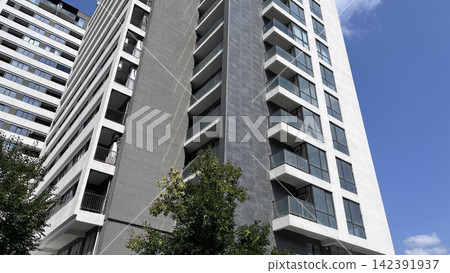 Modern apartment building exterior with balconies Modern apartment building exterior with balconies 142391937