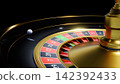A white ball rolling over a black and gold roulette wheel 3d rendering 142392433
