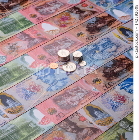 Brunei paper money, dollar banknotes and sen coins as currency for exchange or travel. Brunei money 142392608