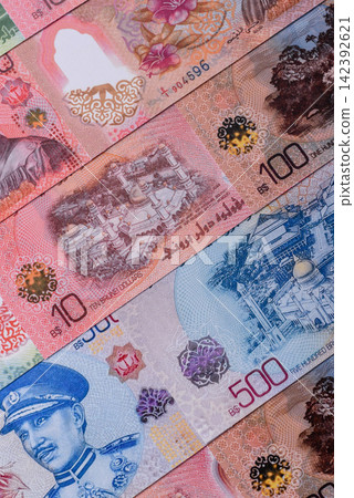 Brunei paper money, dollar banknotes and sen coins as currency for exchange or travel. Brunei money 142392621