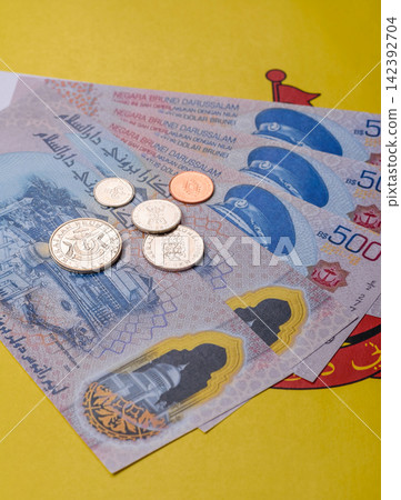 Brunei paper money, dollar banknotes and sen coins as currency for exchange or travel. Brunei money 142392704