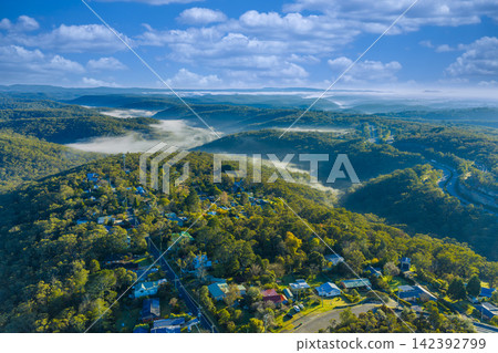 Aerial photograph of fog in the valley near the town of Woodford Aerial photograph of fog in the valley near the town of Woodford 142392799