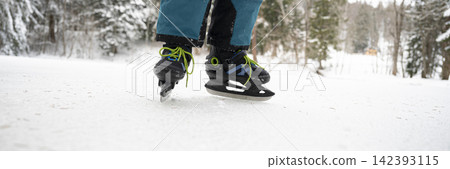 Ice skating in winter wonderland 142393115