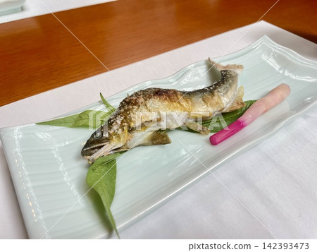 Grilled sweetfish with salt, cooked to perfection. Grilled sweetfish with salt, cooked to perfection. 142393473