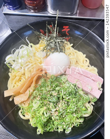 Delicious oil noodles with plenty of toppings and a soft-boiled egg. Delicious oil noodles with plenty of toppings and a soft-boiled egg. 142393547