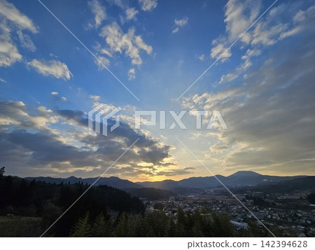 Sunset over the mountains Sunset over the mountains 142394628