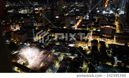 Night Cityscape with Fireworks Display 142395390