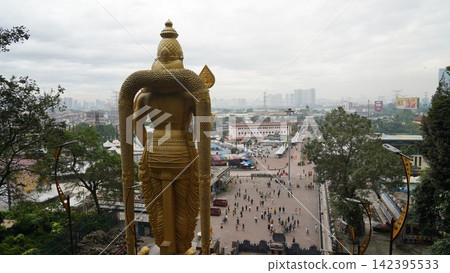 View from Batu Caves Malaysia Golden Statue and Cityscape View from Batu Caves Malaysia Golden Statue and Cityscape 142395533