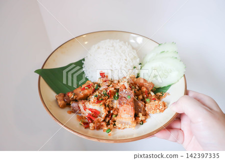 stir fried pork or deep fried pork , fried pork or crispy pork and rice or belly of pork stir fried pork or deep fried pork , fried pork or crispy pork and rice or belly of pork 142397335