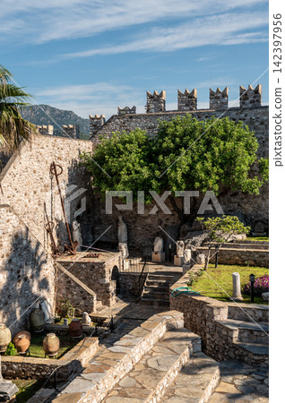 Castle courtyard with garden and ancient walls in Marmaris Turkey 142397956