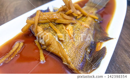 Braised flounder with ginger Braised flounder with ginger 142398354
