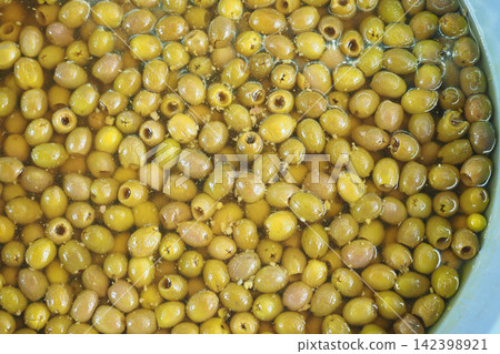 Green olives in brine ready for sale Green olives in brine ready for sale 142398921