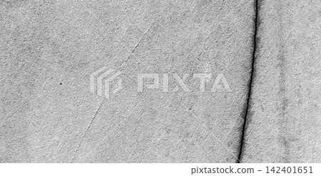 Vertical cracks in the texture of a weathered concrete wall. Vertical cracks in the texture of a weathered concrete wall. 142401651