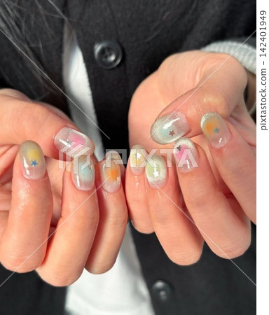 Creative nail art featuring intricate designs, vibrant colors, and unique patterns. Perfect for beauty and fashion photography, showcasing trends in nail designs and the artistry of manicure. Creative nail art featuring intricate designs, vibrant colors, and unique patterns. Perfect for beauty and fashion photography, showcasing trends in nail designs and the artistry of manicure. 142401949