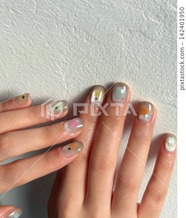 Creative nail art featuring intricate designs, vibrant colors, and unique patterns. Perfect for beauty and fashion photography, showcasing trends in nail designs and the artistry of manicure. Creative nail art featuring intricate designs, vibrant colors, and unique patterns. Perfect for beauty and fashion photography, showcasing trends in nail designs and the artistry of manicure. 142401950