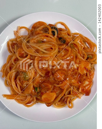 Classic spaghetti coated in rich tomato sauce, offering a simple yet delicious combination of tangy, savory flavors perfect for a comforting meal. Classic spaghetti coated in rich tomato sauce, offering a simple yet delicious combination of tangy, savory flavors perfect for a comforting meal. 142402003