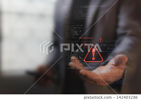 Person holding smartphone with warning and alert icons on screen 142403286