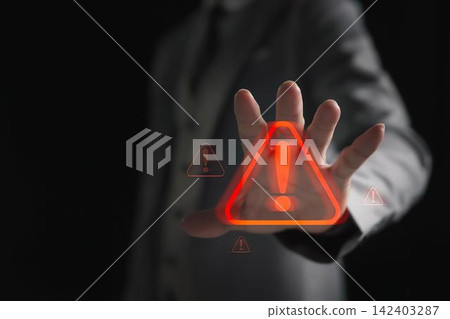 Person pointing at glowing warning sign with exclamation mark Person pointing at glowing warning sign with exclamation mark 142403287