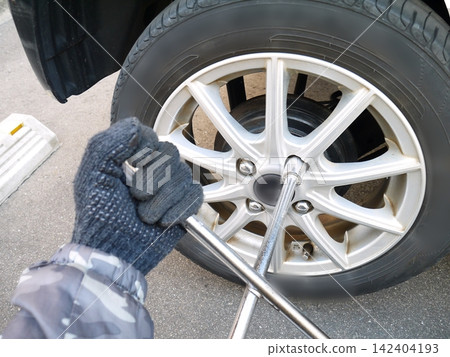 Changing the tires on a private car Changing the tires on a private car 142404193