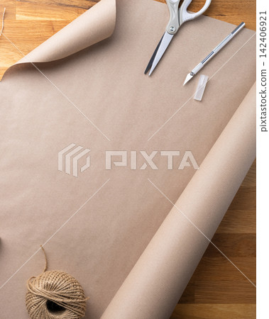 Festive Christmas flat lay with wrapped presents and rustic holiday decorations Festive Christmas flat lay with wrapped presents and rustic holiday decorations 142406921