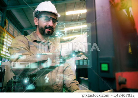 Engineers and workers work in the factory. Engineers and workers work in the factory. 142407032
