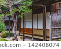 The exquisite beauty of the tea house architecture in the sacred pond garden, woven together by delicate shoji screens and the green of pine trees. March 2024. 142408074