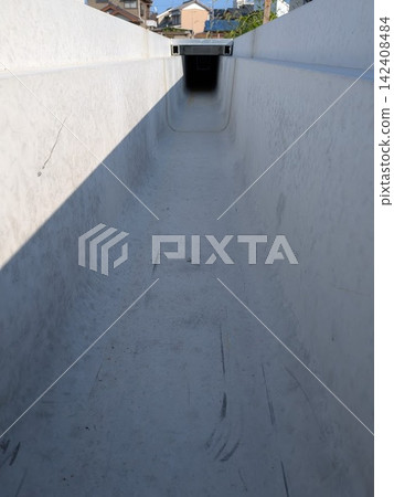 Inside a newly installed drainage ditch Inside a newly installed drainage ditch 142408484