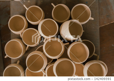 The process of creating pottery. The process of creating pottery. 142409391